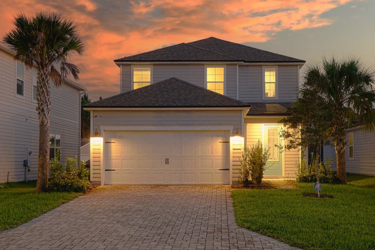 Twilight photo of the same property, taken at 7:45 pm