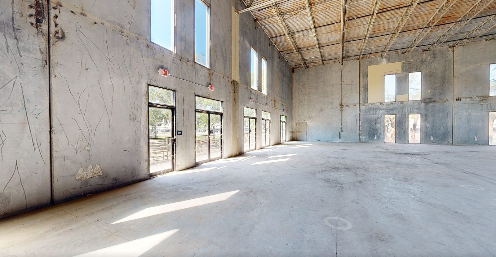Empty commercial shell interior before build-out, captured as a Matterport 3D scan baseline - Baycenter Road, Jacksonville FL